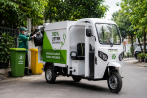 Kendaraan sampah listrik roda tiga untuk mendukung pengangkutan dan pengelolaan sampah.